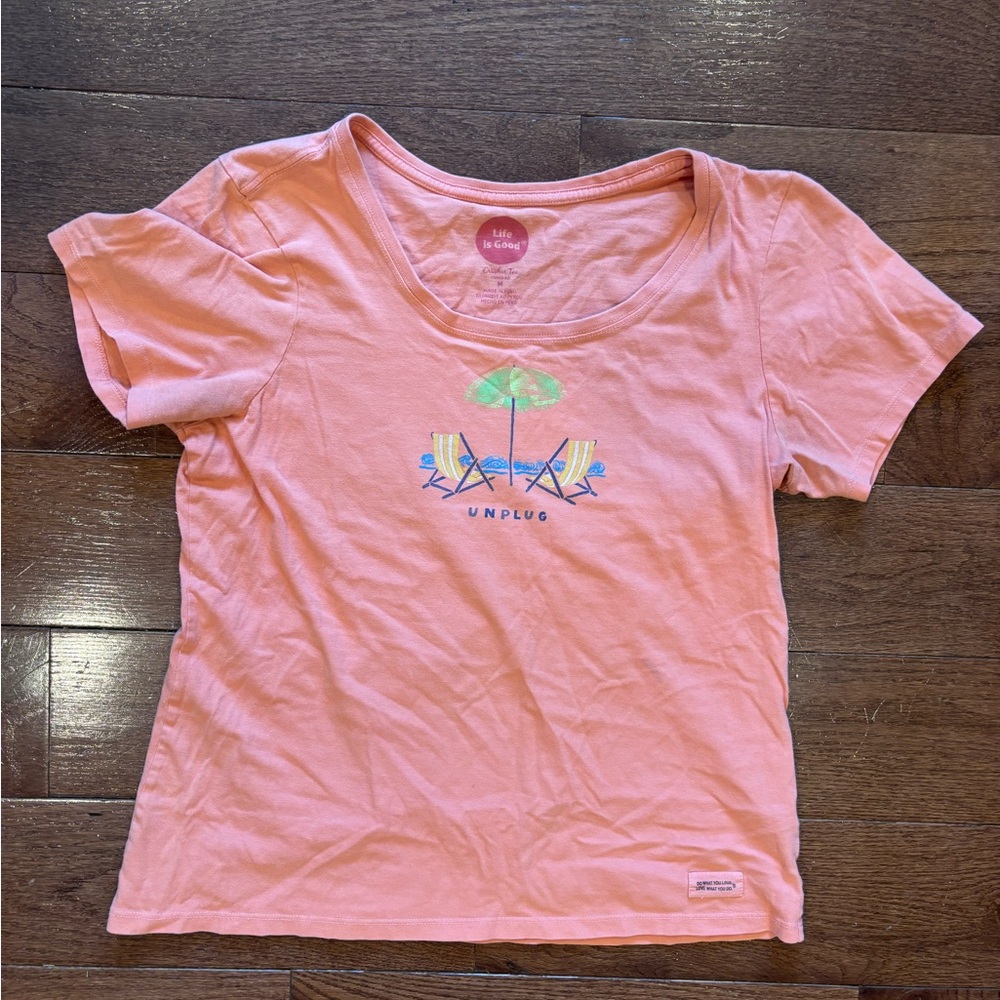 Salmon Colored Graphic Tee with Beach Print